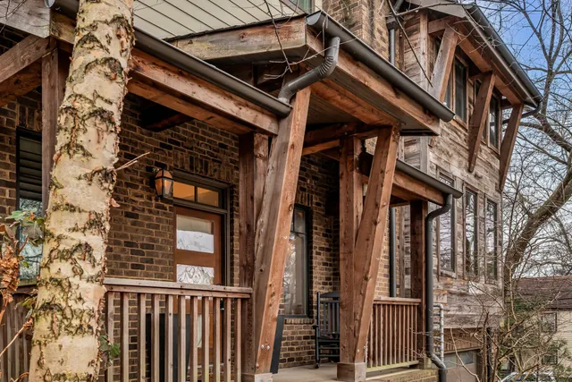 a view of a brick house with a door