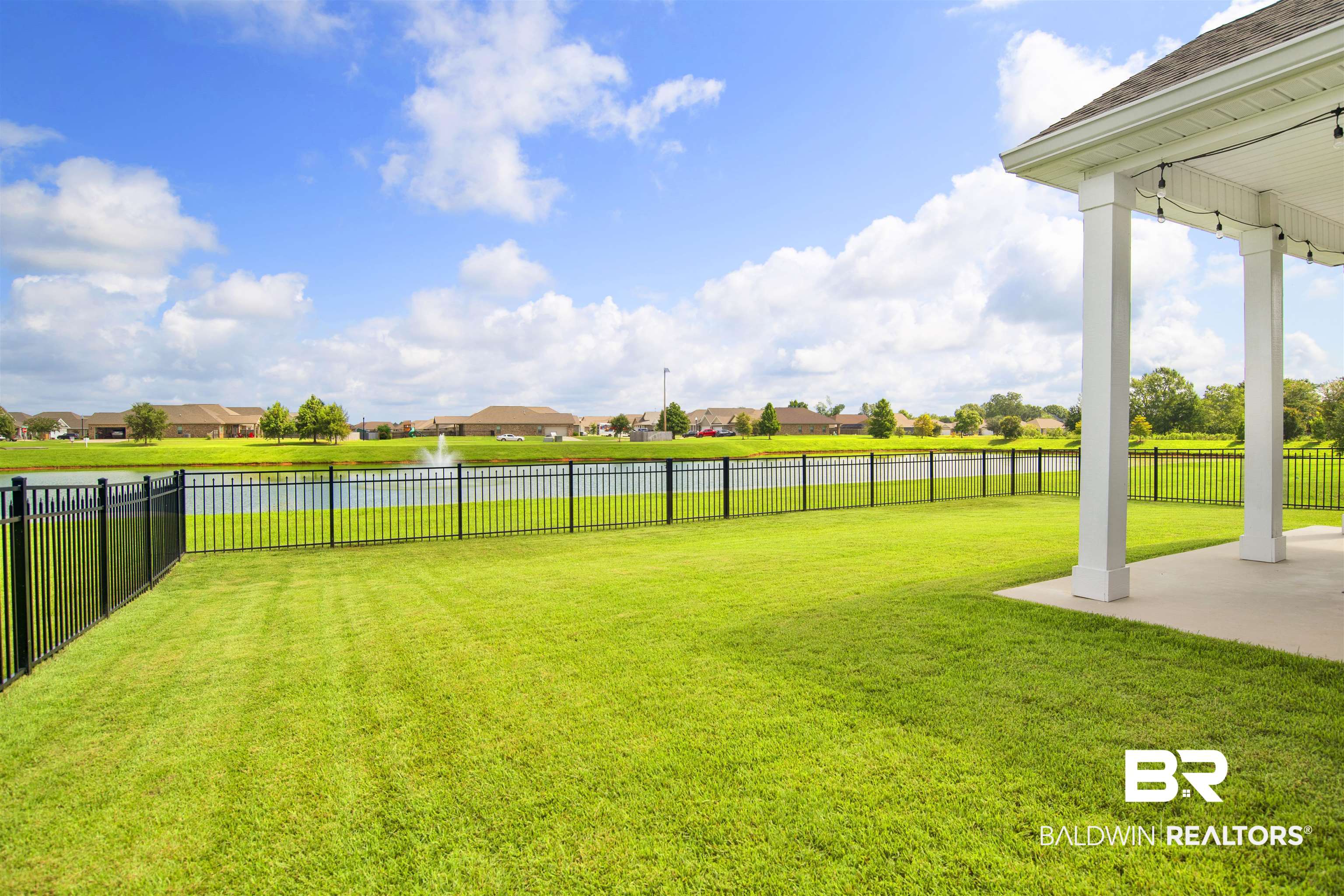 9431 Swan Point Road Daphne, AL 36526 - Photo 7 of 35 Fenced backyard with a residential view, a water view, and a patio
