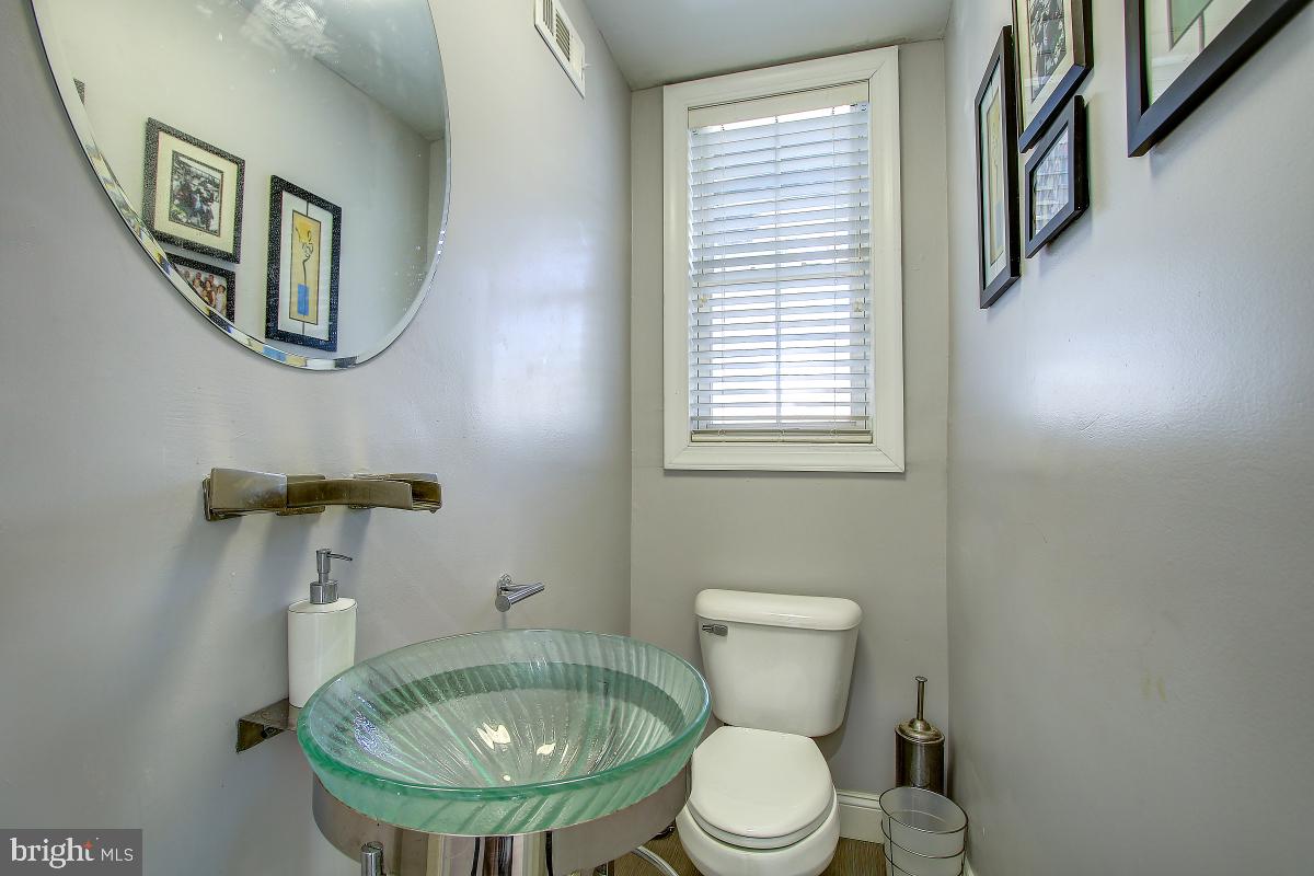 3921 Ingomar Street Northwest Washington, DC 20015 - Photo 14 of 33 Private Powder Room to the side of Kitchen.
