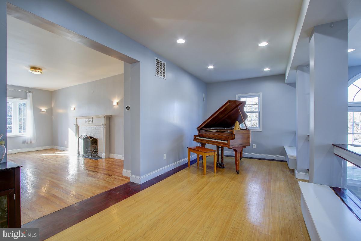 3921 Ingomar Street Northwest Washington, DC 20015 - Photo 15 of 33 Large Staging Area used to showcase Baby Grand.
