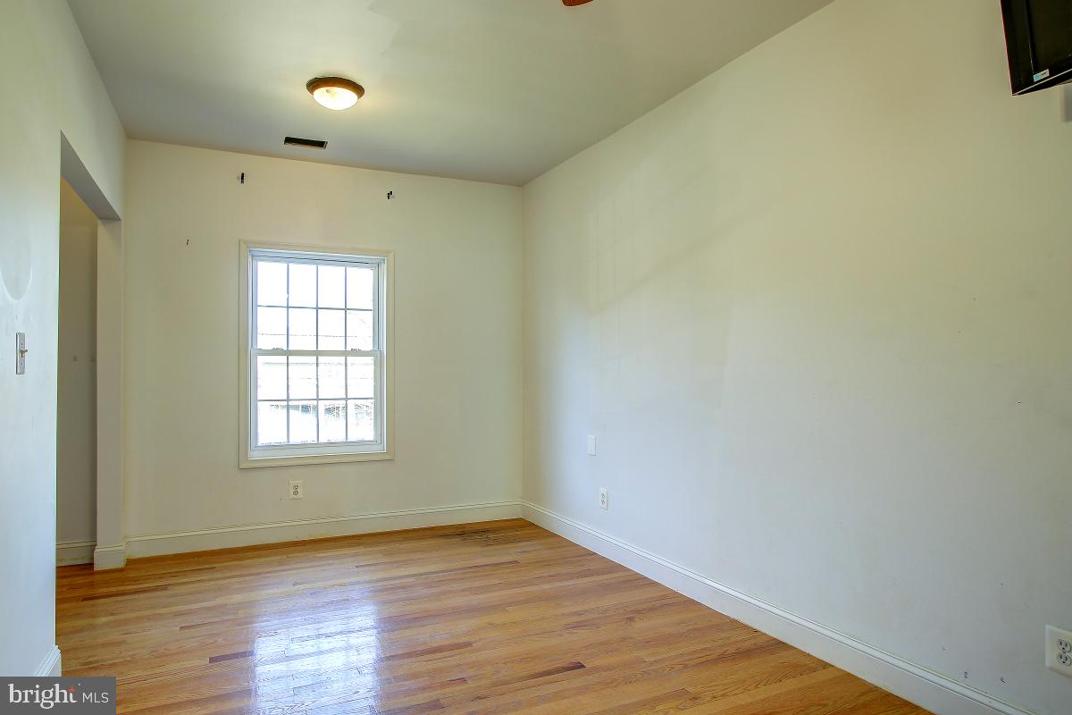 3921 Ingomar Street Northwest Washington, DC 20015 - Photo 19 of 33 First of three additional bedrooms.
