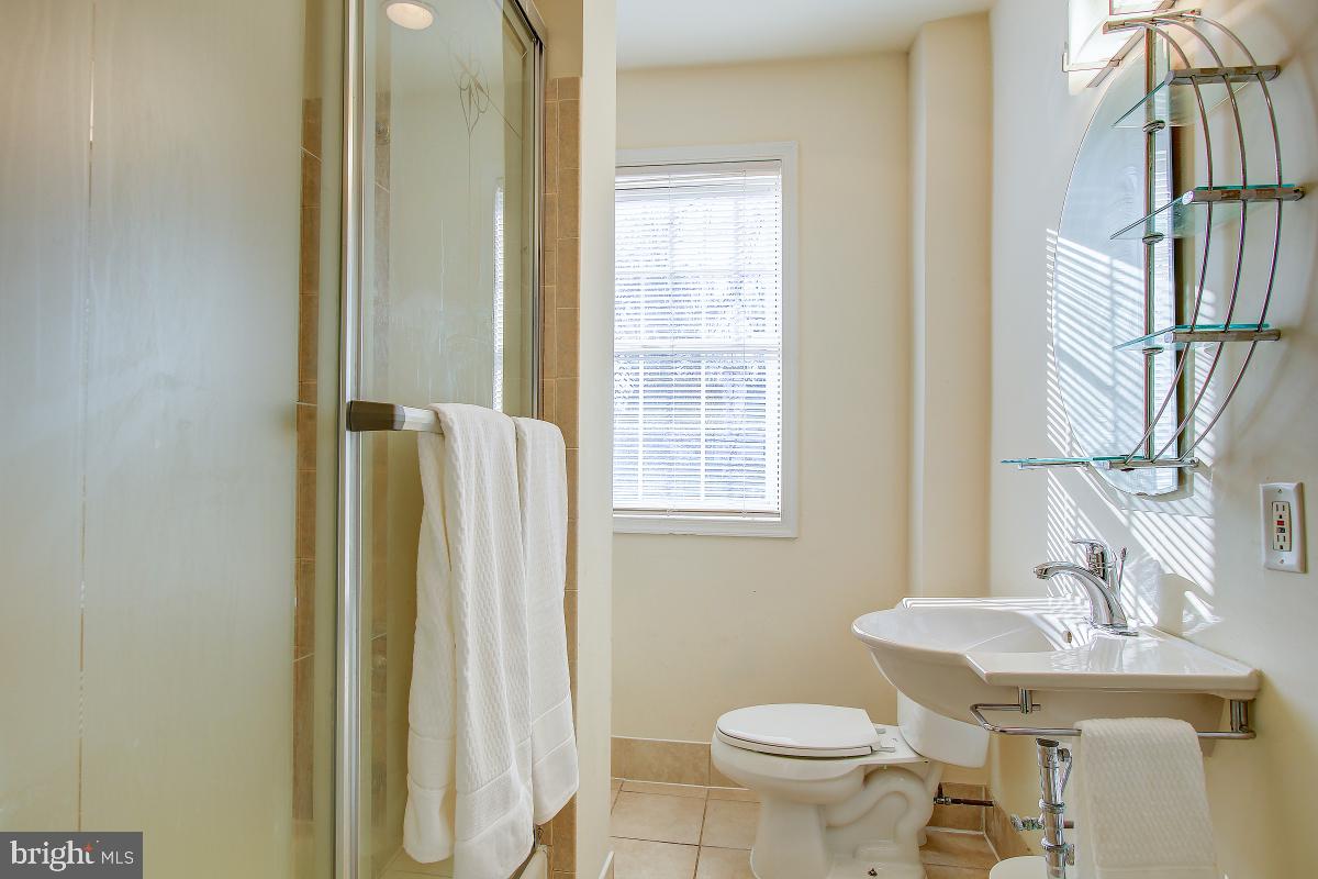 3921 Ingomar Street Northwest Washington, DC 20015 - Photo 22 of 33 Full Hallway Bath with Shower/Tub.