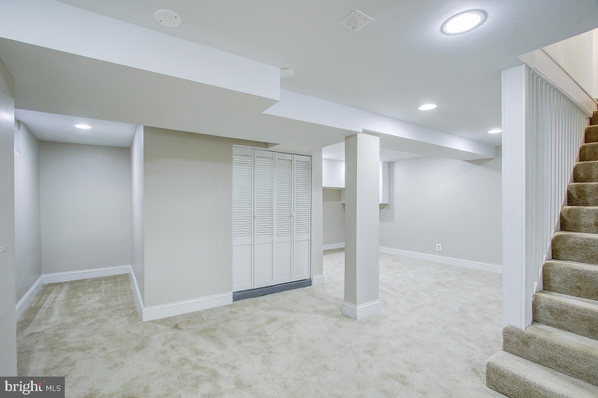 3921 Ingomar Street Northwest Washington, DC 20015 - Photo 28 of 33 Fully finished lower level with carpet.