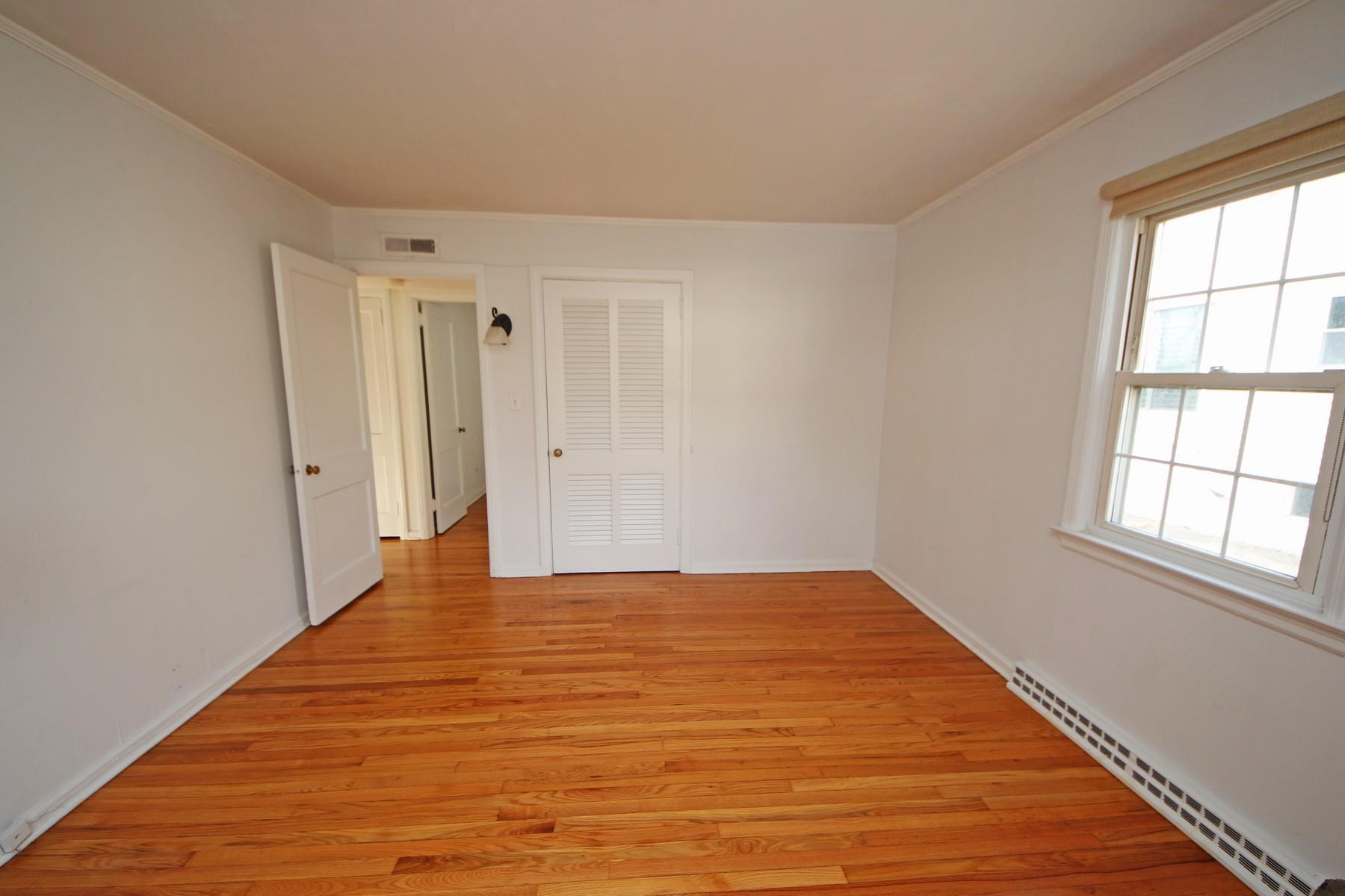68 Maple Street Darien, CT 06820 - Photo 11 of 25 a view of an empty room and window