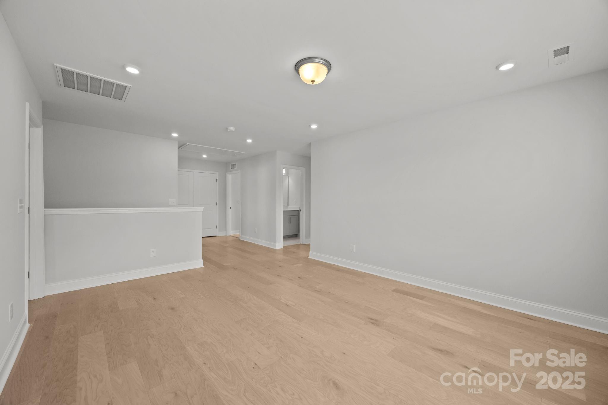 885 Regulus Court York, SC 29745 - Photo 20 of 46 a view of an empty room with a kitchen