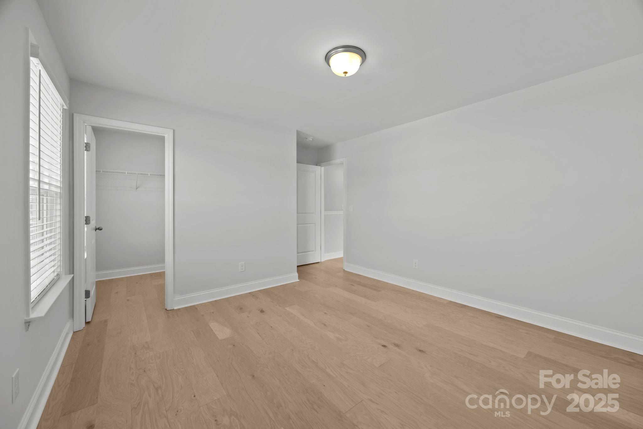 885 Regulus Court York, SC 29745 - Photo 30 of 46 an empty room with an entryway and empty room