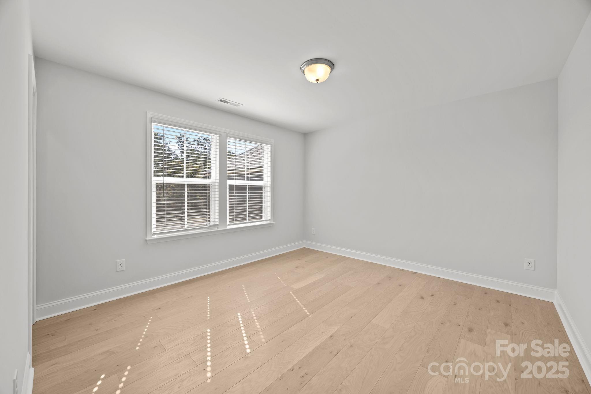 885 Regulus Court York, SC 29745 - Photo 32 of 46 an empty room with windows