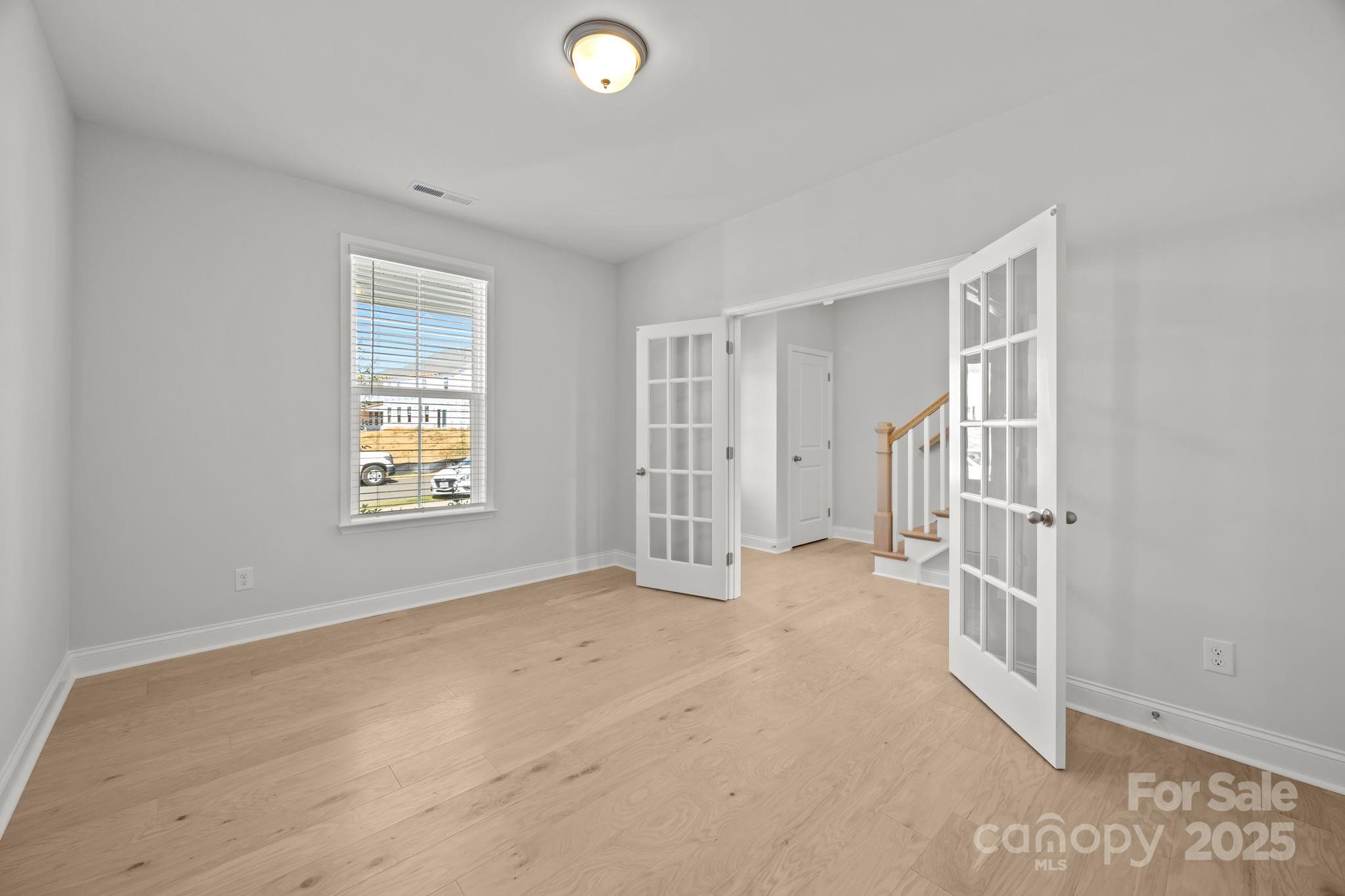 885 Regulus Court York, SC 29745 - Photo 7 of 46 an empty room with windows