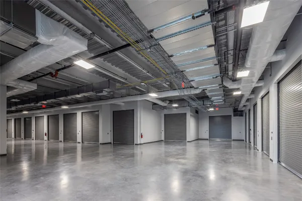 a view of water heater room with stairs