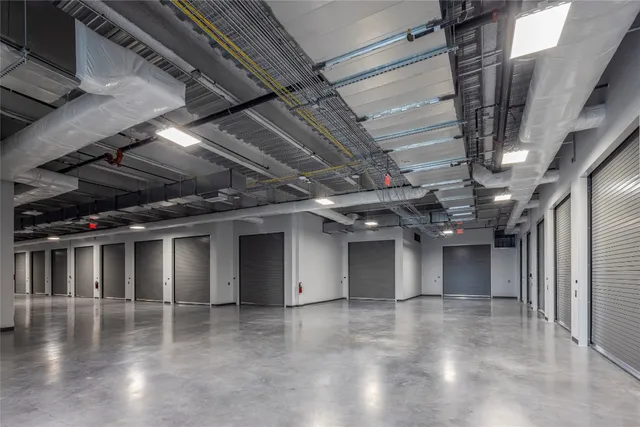 a view of water heater room with stairs