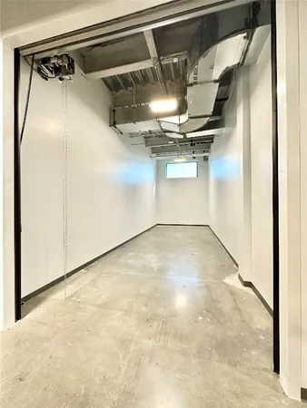 a view of a room with racks on the wall