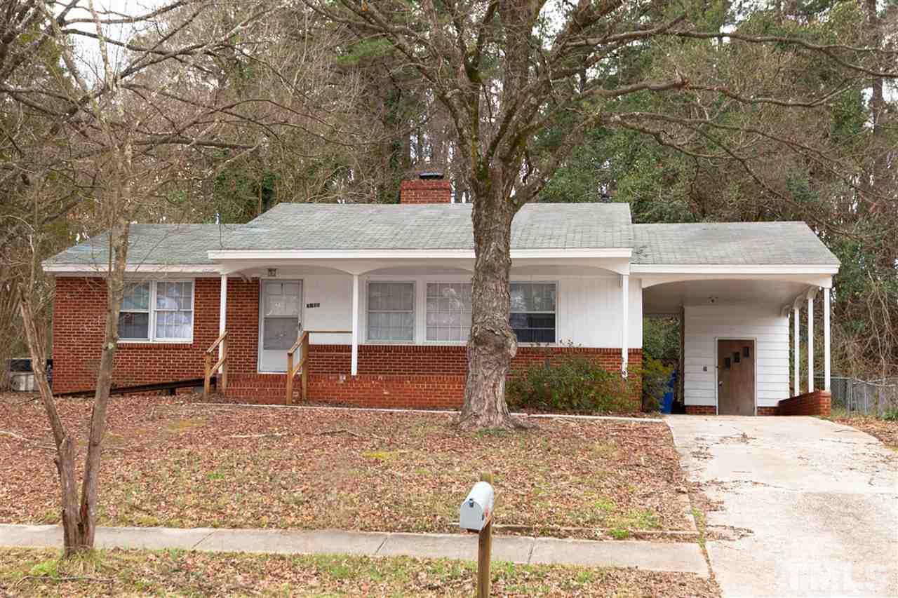3105 Brentwood Road Raleigh, NC 27604 - Photo 2 of 25 front view of a house with a yard