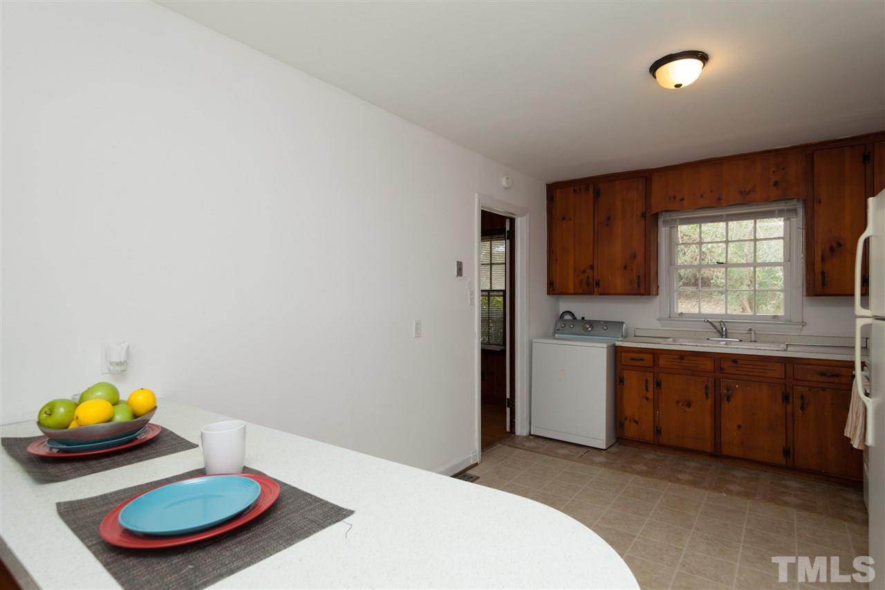 3105 Brentwood Road Raleigh, NC 27604 - Photo 11 of 25 a bedroom with a bed and a sink