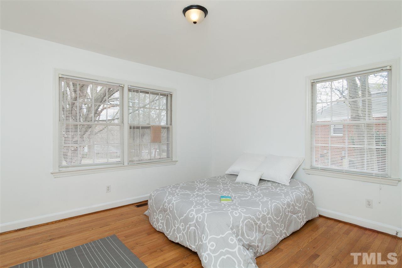 3105 Brentwood Road Raleigh, NC 27604 - Photo 15 of 25 a bedroom with a bed and a window