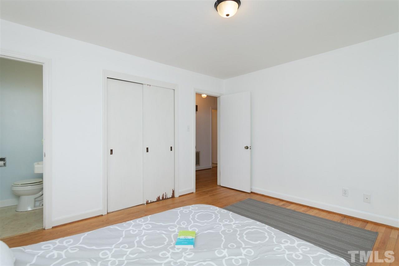3105 Brentwood Road Raleigh, NC 27604 - Photo 18 of 25 a view of a room with wooden floor and bathroom