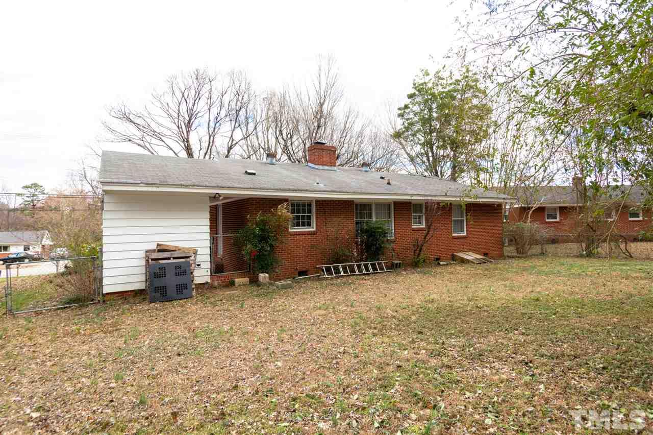3105 Brentwood Road Raleigh, NC 27604 - Photo 25 of 25 a view of a house with a yard