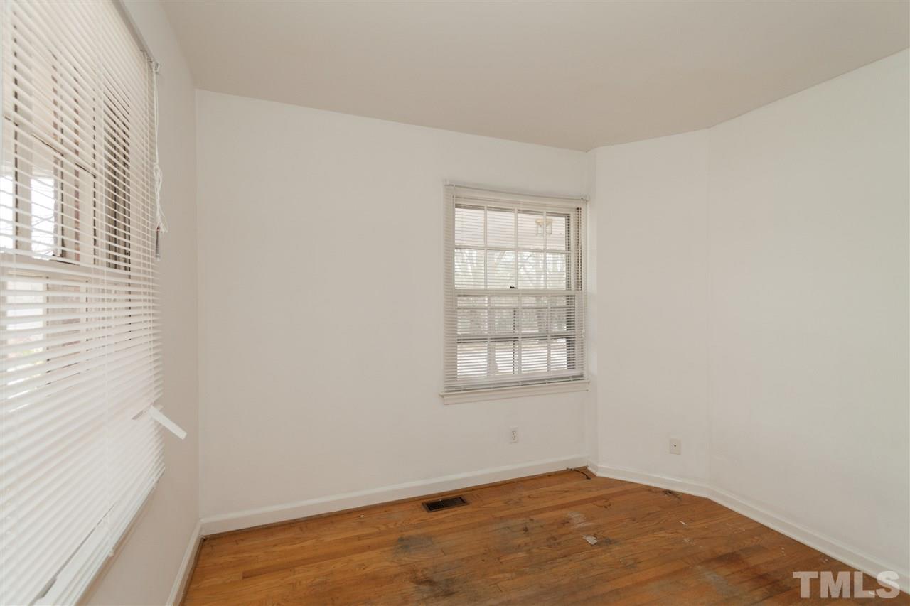 3105 Brentwood Road Raleigh, NC 27604 - Photo 9 of 25 an empty room with windows