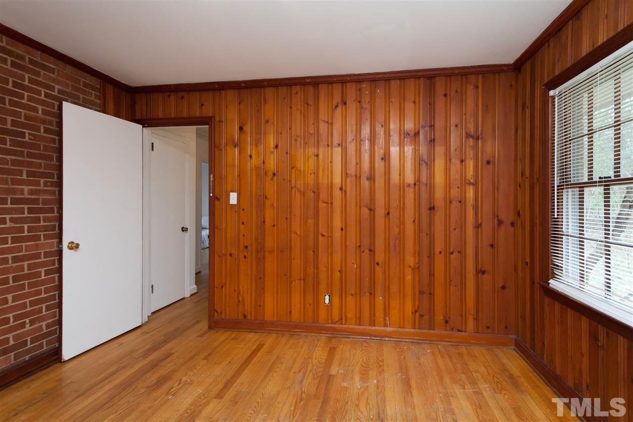 3105 Brentwood Road Raleigh, NC 27604 - Photo 10 of 25 a view of a room with wooden floor and a window