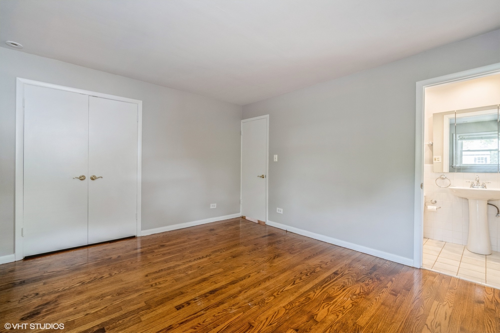 1644 Pfingsten Road Northbrook, IL 60062 - Photo 12 of 17 a view of empty room with wooden floor