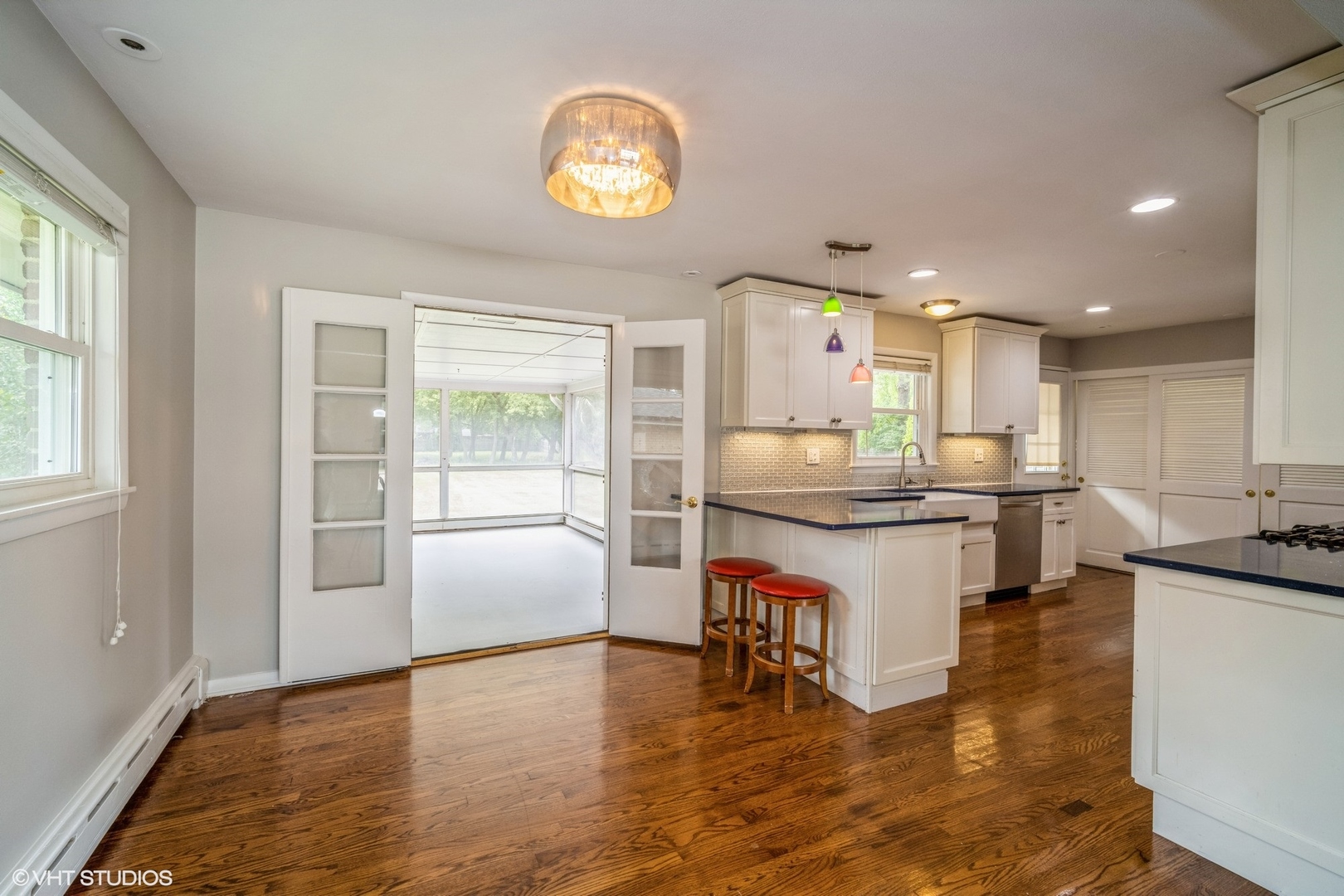 1644 Pfingsten Road Northbrook, IL 60062 - Photo 9 of 17 a kitchen with a sink cabinets and wooden floor