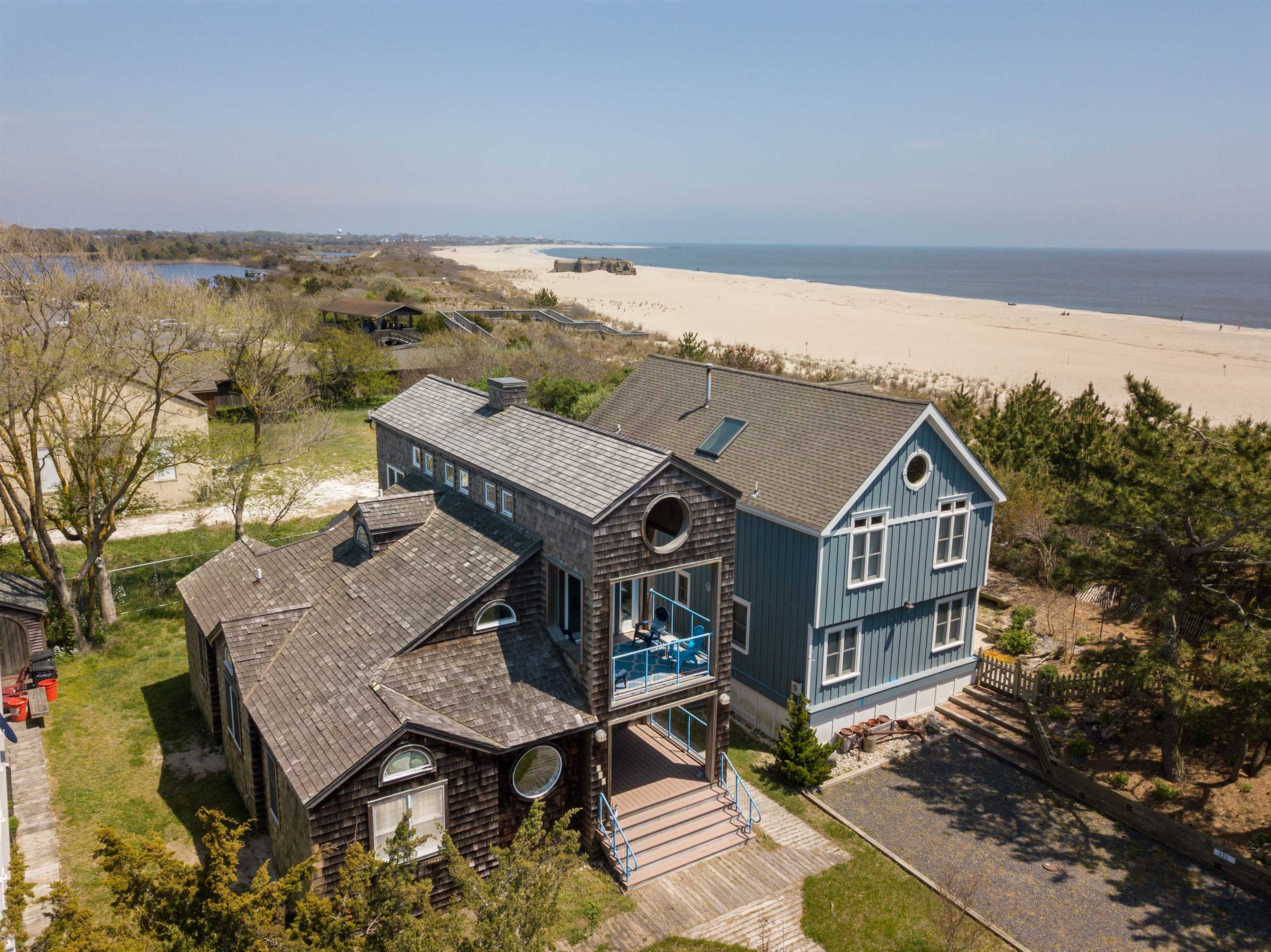 201 Lighthouse Cape May Point, NJ 08212 - Photo 23 of 24 an aerial view of a house with a yard and balcony