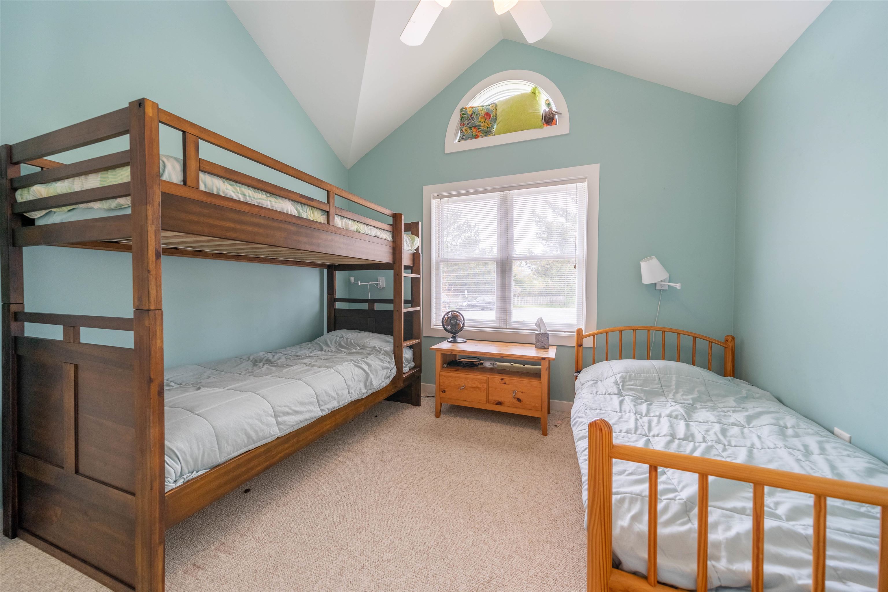 201 Lighthouse Cape May Point, NJ 08212 - Photo 3 of 24 a bedroom with a bed and a window