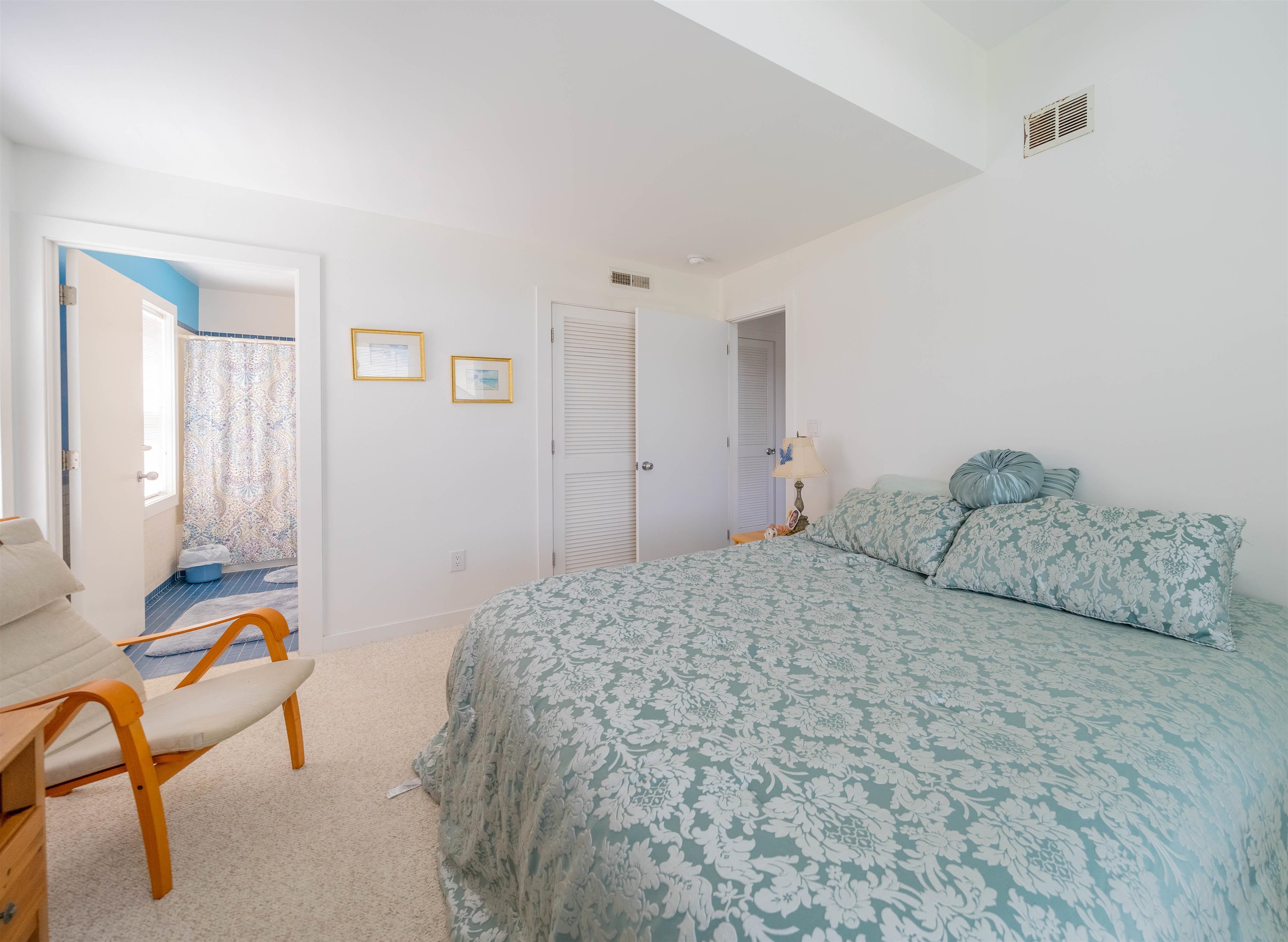 201 Lighthouse Cape May Point, NJ 08212 - Photo 5 of 24 a bedroom with a bed and furniture