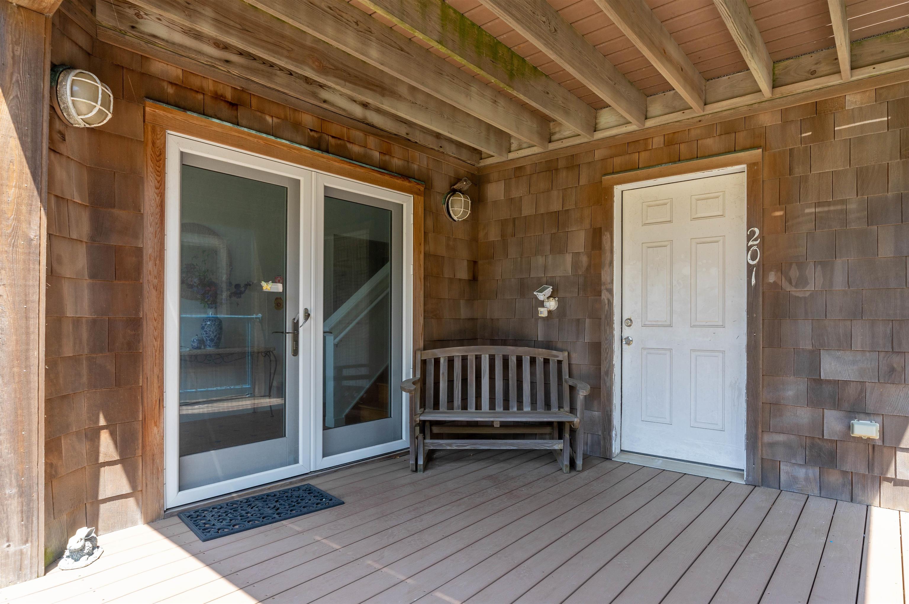 201 Lighthouse Cape May Point, NJ 08212 - Photo 7 of 24 a view of porch with furniture and wooden floor