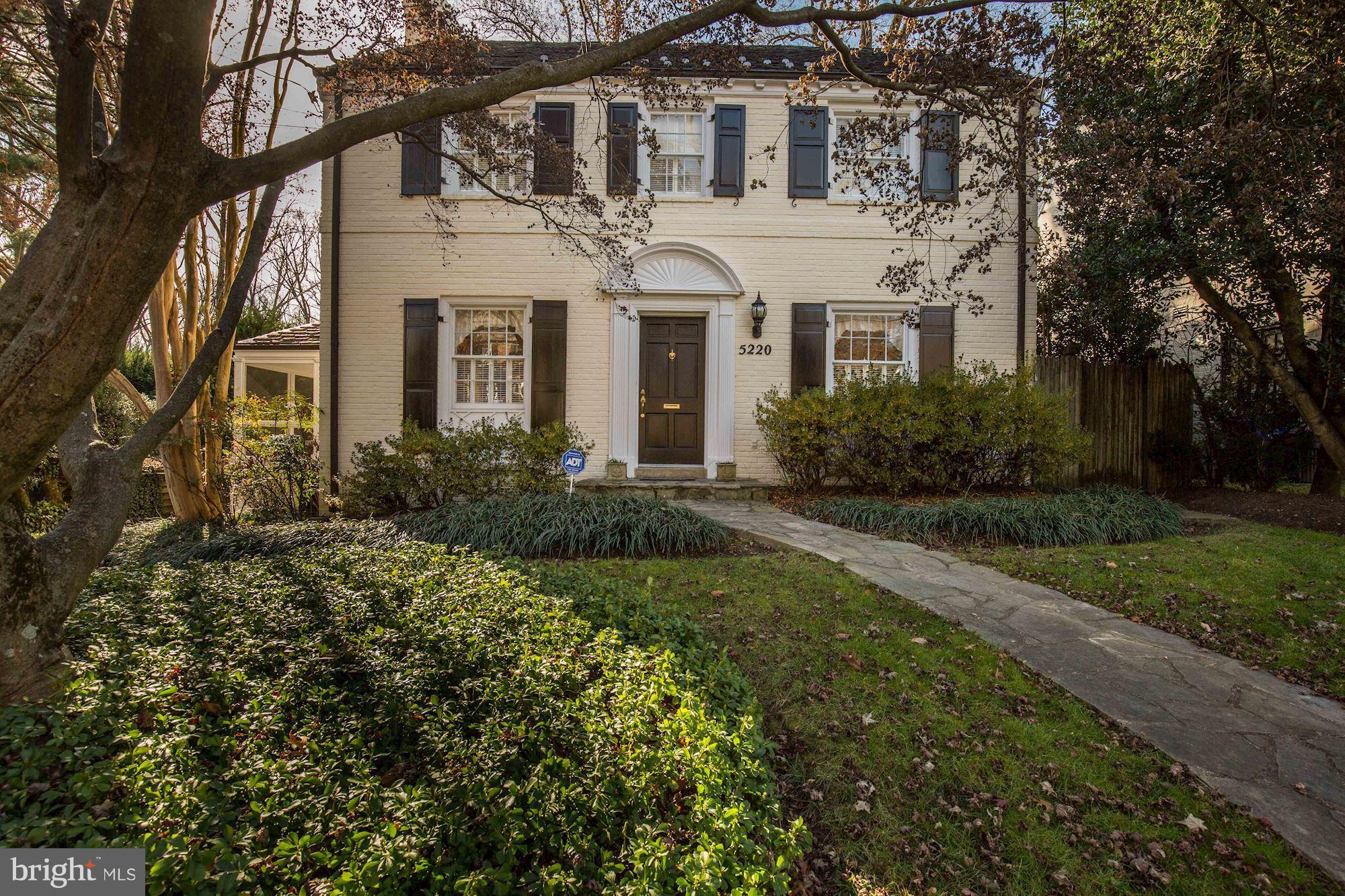 5220 Elliott Road Bethesda, MD 20816 - Photo 2 of 30 a front view of a house with garden