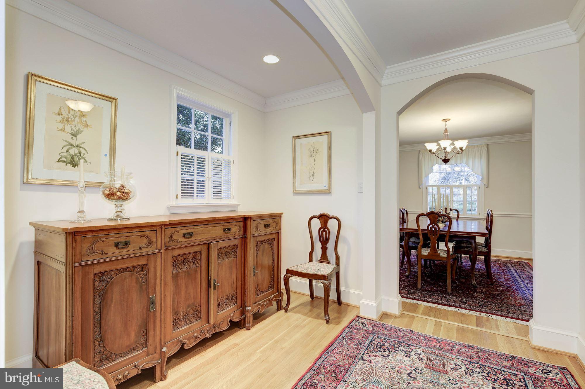 5220 Elliott Road Bethesda, MD 20816 - Photo 15 of 30 a view of a center island and dining table
