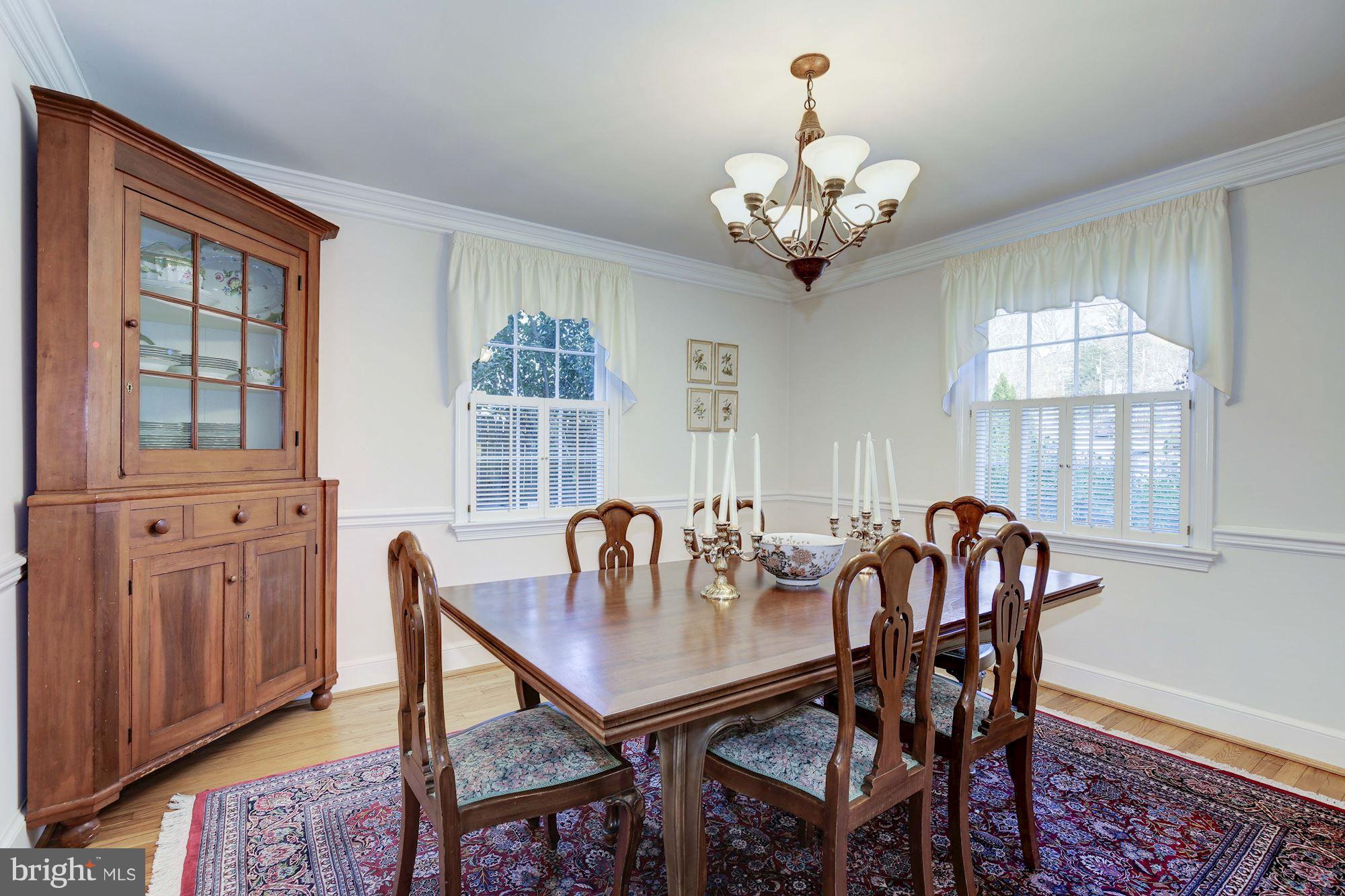 5220 Elliott Road Bethesda, MD 20816 - Photo 16 of 30 a view of a dining room with furniture window and outside view