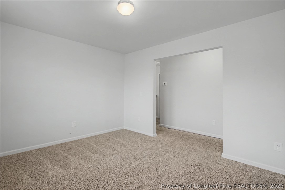 1717 Ennismore Road Hope Mills, NC 28348 - Photo 22 of 33 a view of an empty room