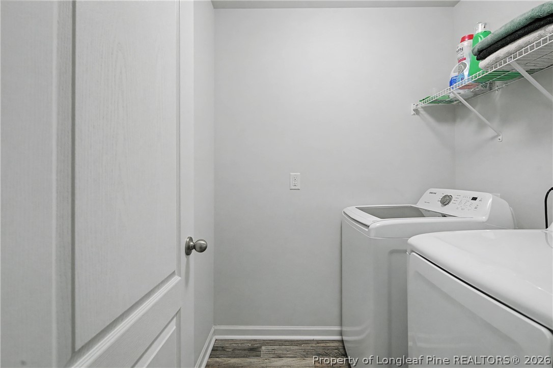 1717 Ennismore Road Hope Mills, NC 28348 - Photo 25 of 33 a utility room with dryer and washer