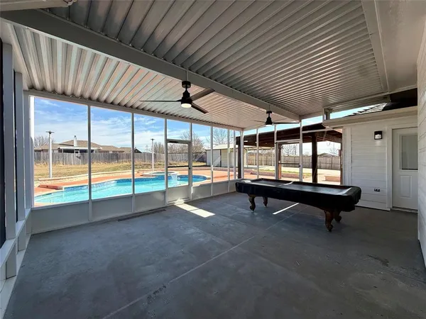 a swimming pool with couch