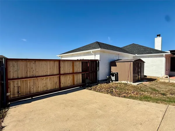 a front view of a house with a garage