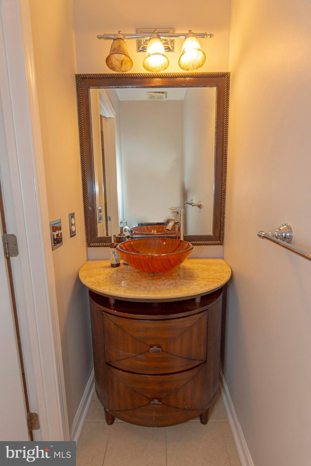 6 Howe Court Pennington, NJ 08534 - Photo 12 of 35 a bathroom with a sink and a mirror