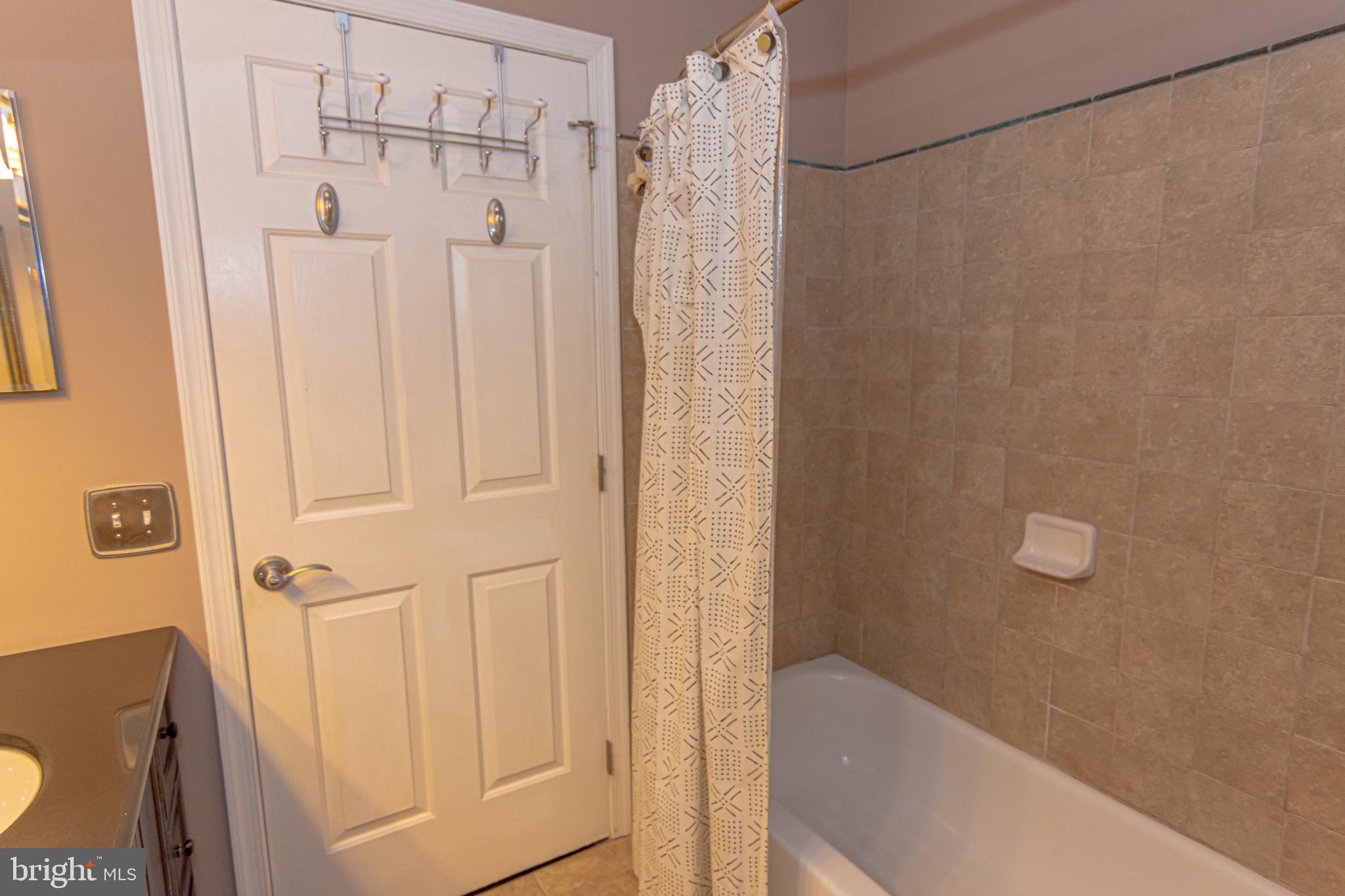 6 Howe Court Pennington, NJ 08534 - Photo 25 of 35 a bathroom with a shower