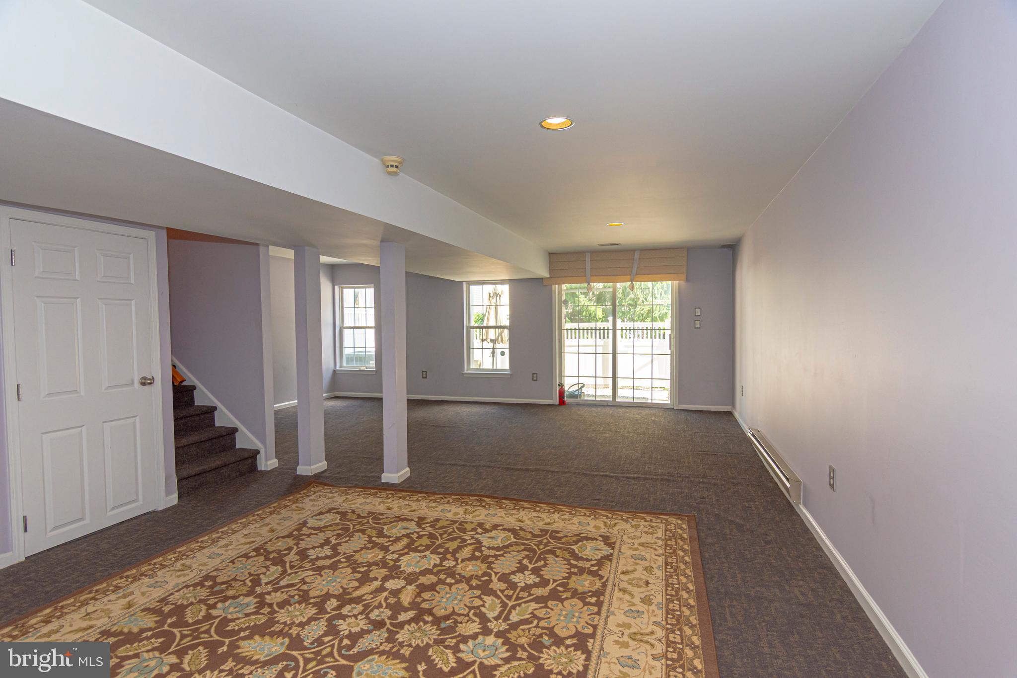 6 Howe Court Pennington, NJ 08534 - Photo 30 of 35 a view of empty room with wooden floor and window