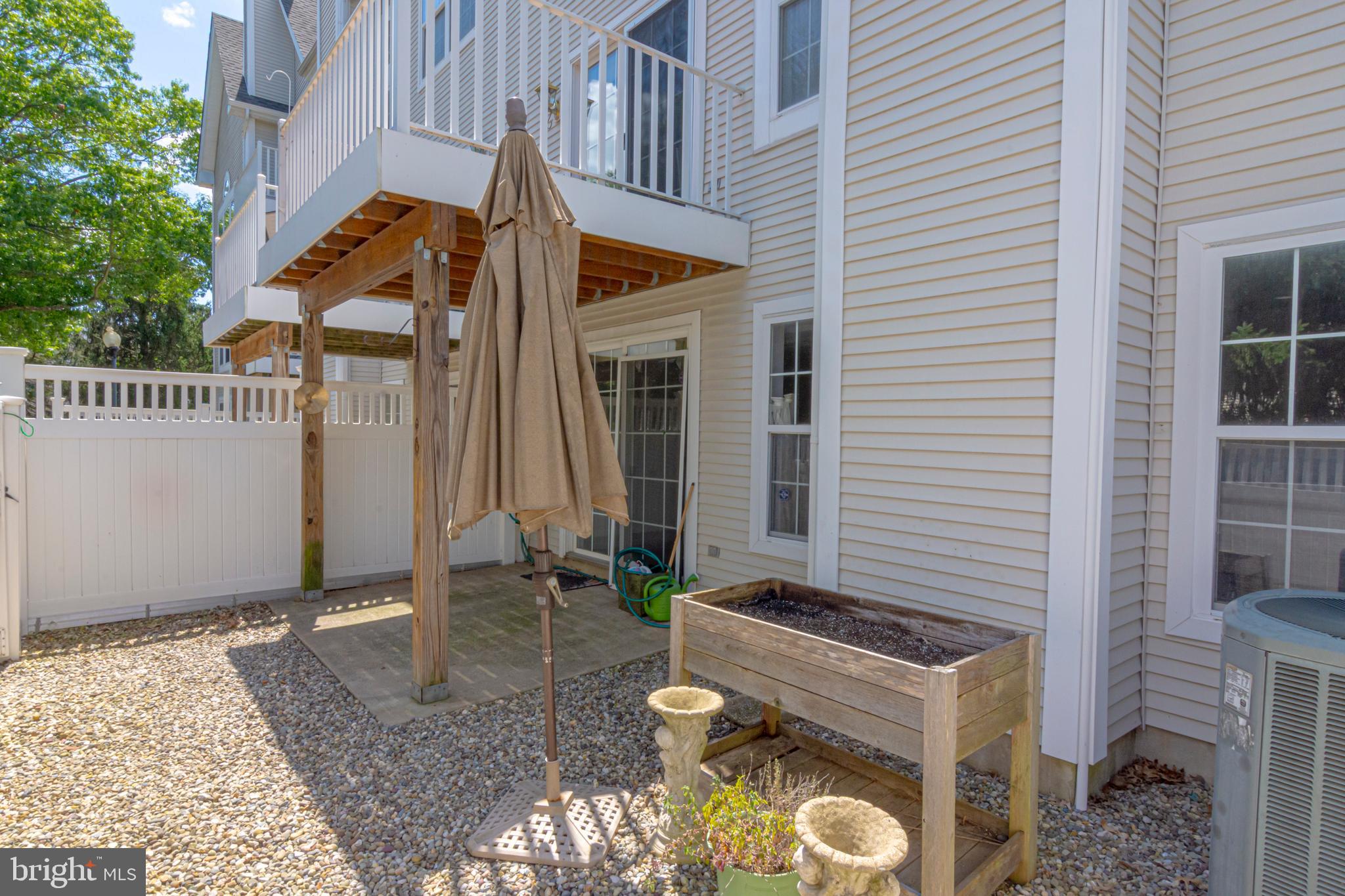 6 Howe Court Pennington, NJ 08534 - Photo 34 of 35 a front view of a house with garden