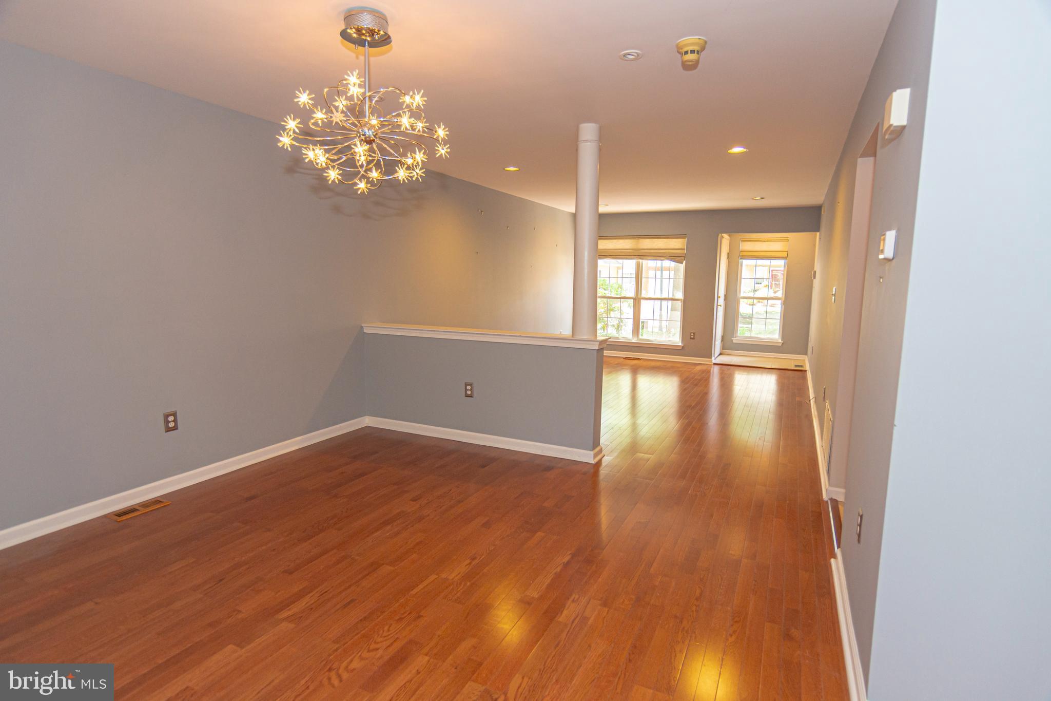 6 Howe Court Pennington, NJ 08534 - Photo 5 of 35 wooden floor in an empty room with a window