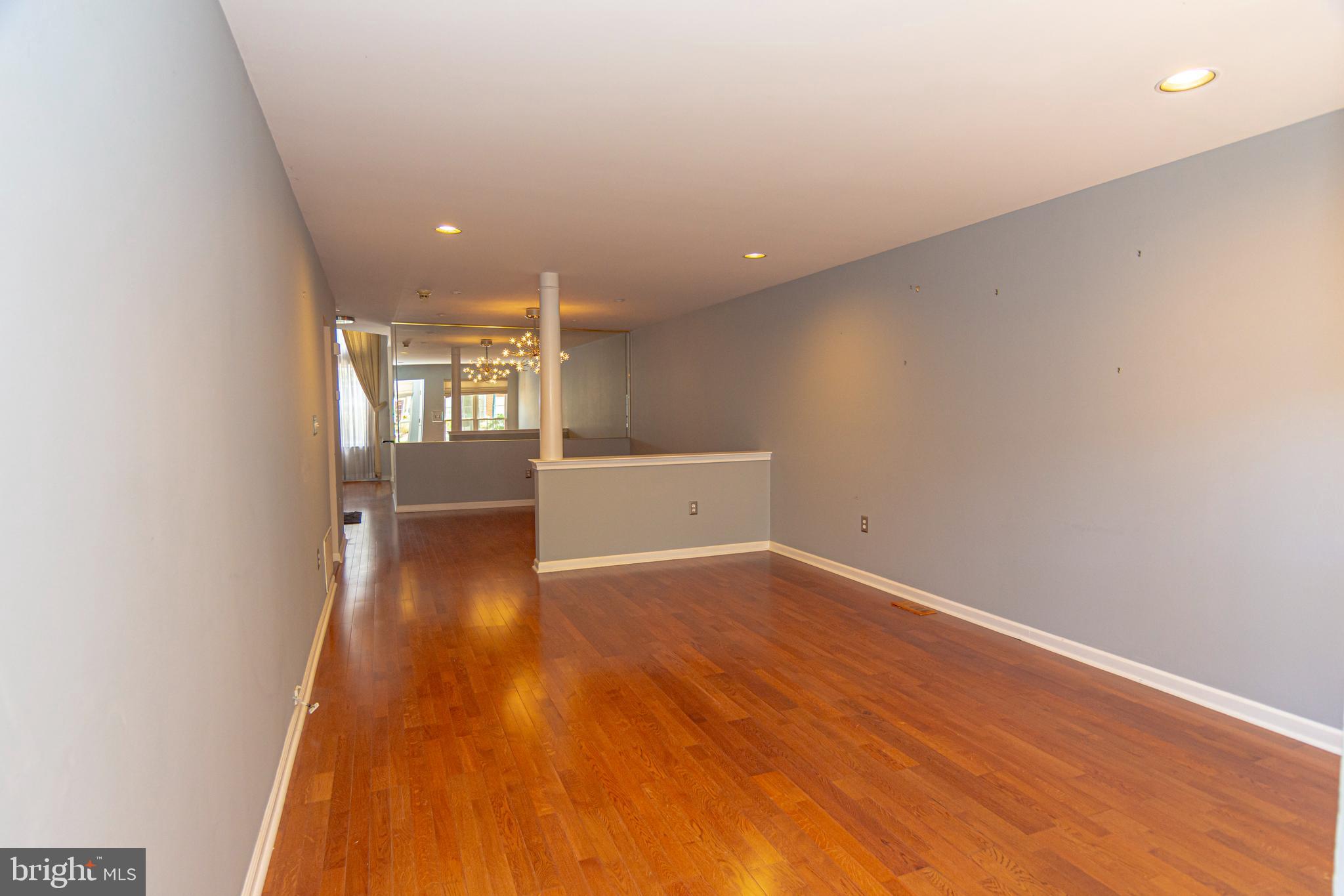 6 Howe Court Pennington, NJ 08534 - Photo 6 of 35 wooden floor in an empty room with a window