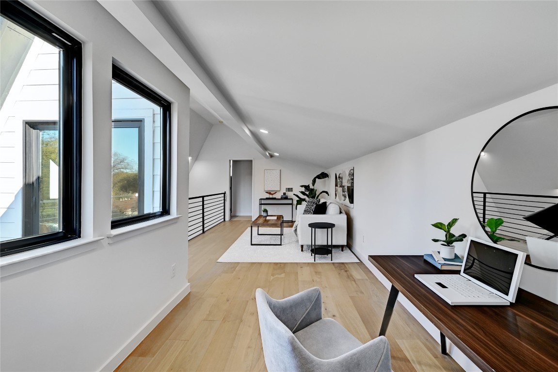 2717 Lyons Road, Unit 1 Austin, TX 78702 - Photo 16 of 22 Office space featuring light wood-type flooring and vaulted ceiling