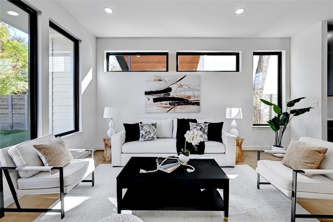 2717 Lyons Road, Unit 1 Austin, TX 78702 - Photo 3 of 22 Living room featuring light wood-type flooring and a wealth of natural light