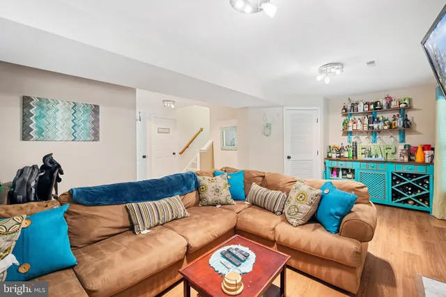 a living room with furniture and a couch