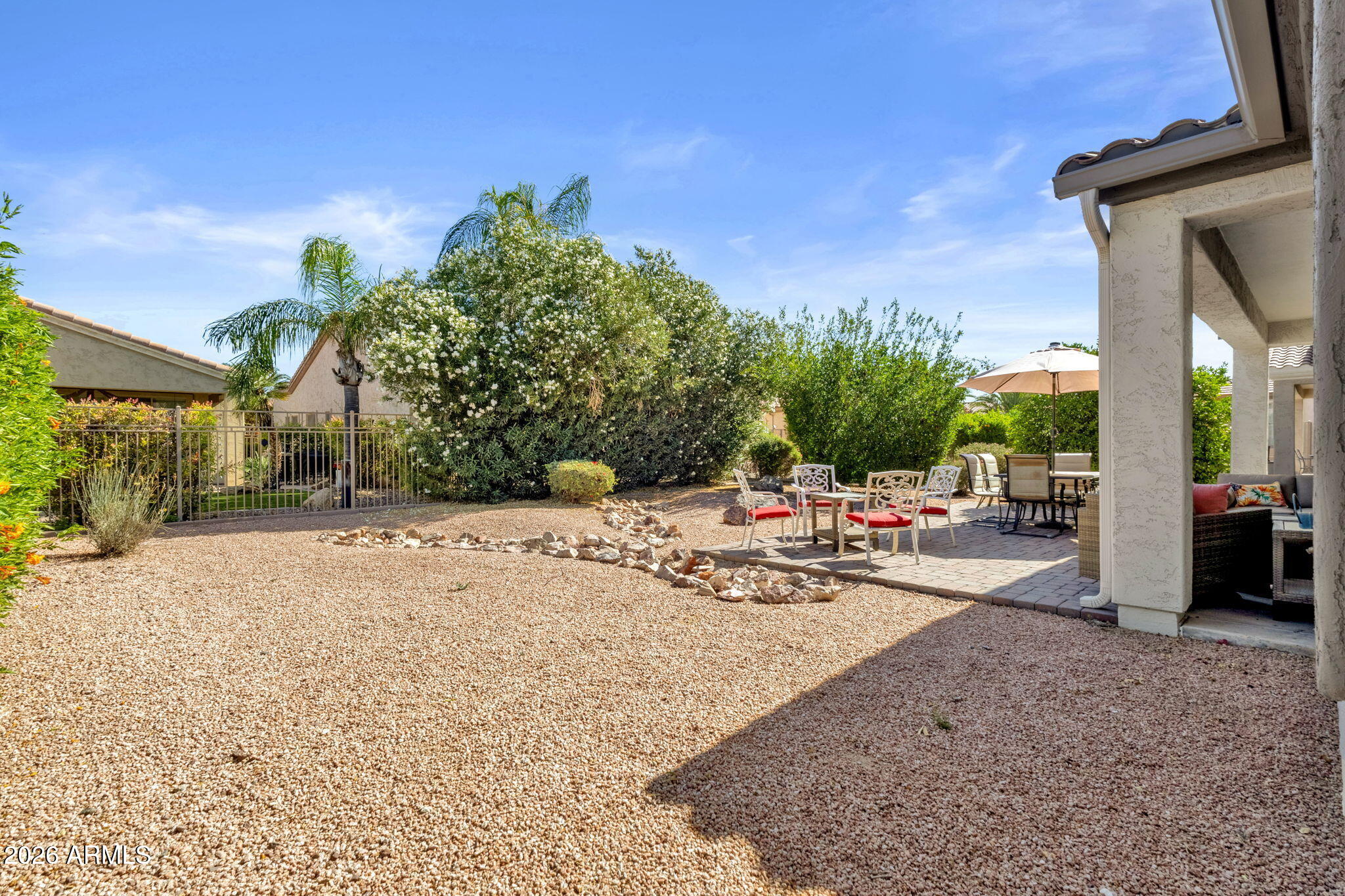 4094 East Azalea Drive Gilbert, AZ 85298 - Photo 18 of 21 a view of a backyard with sitting area