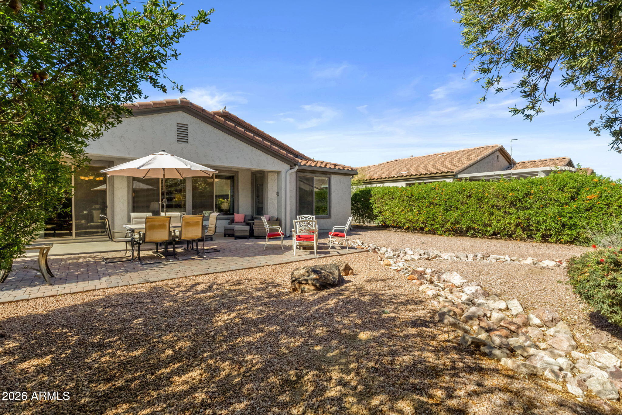 4094 East Azalea Drive Gilbert, AZ 85298 - Photo 20 of 21 a view of a house with backyard and sitting area
