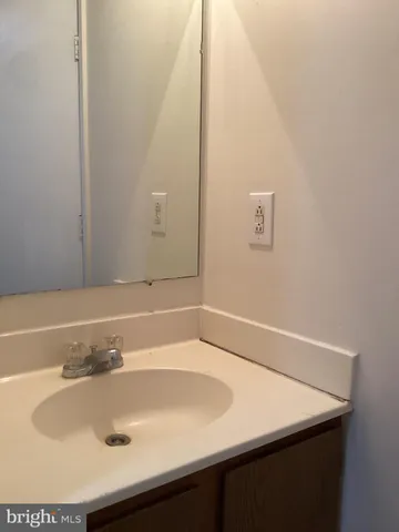 a bathroom with a sink and a bathtub
