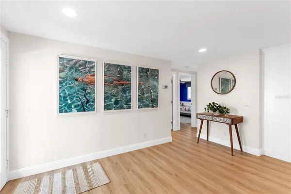 wooden floor with a window in a room