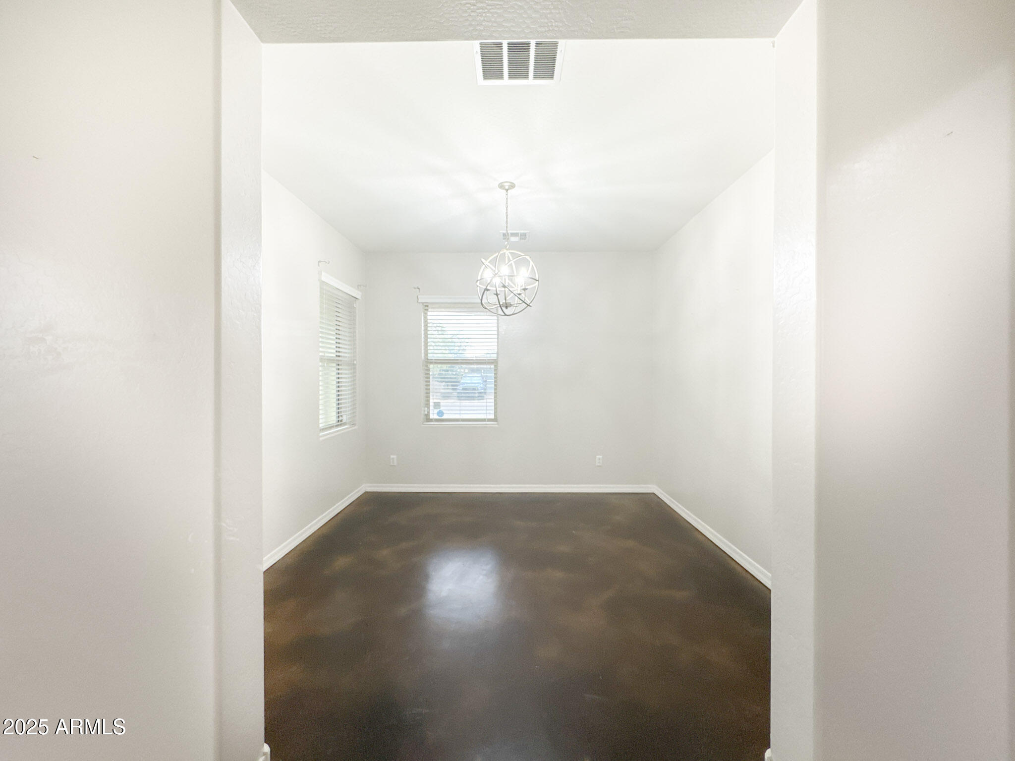 3141 East Patrick Street Gilbert, AZ 85295 - Photo 10 of 32 an empty room with windows and cabinet