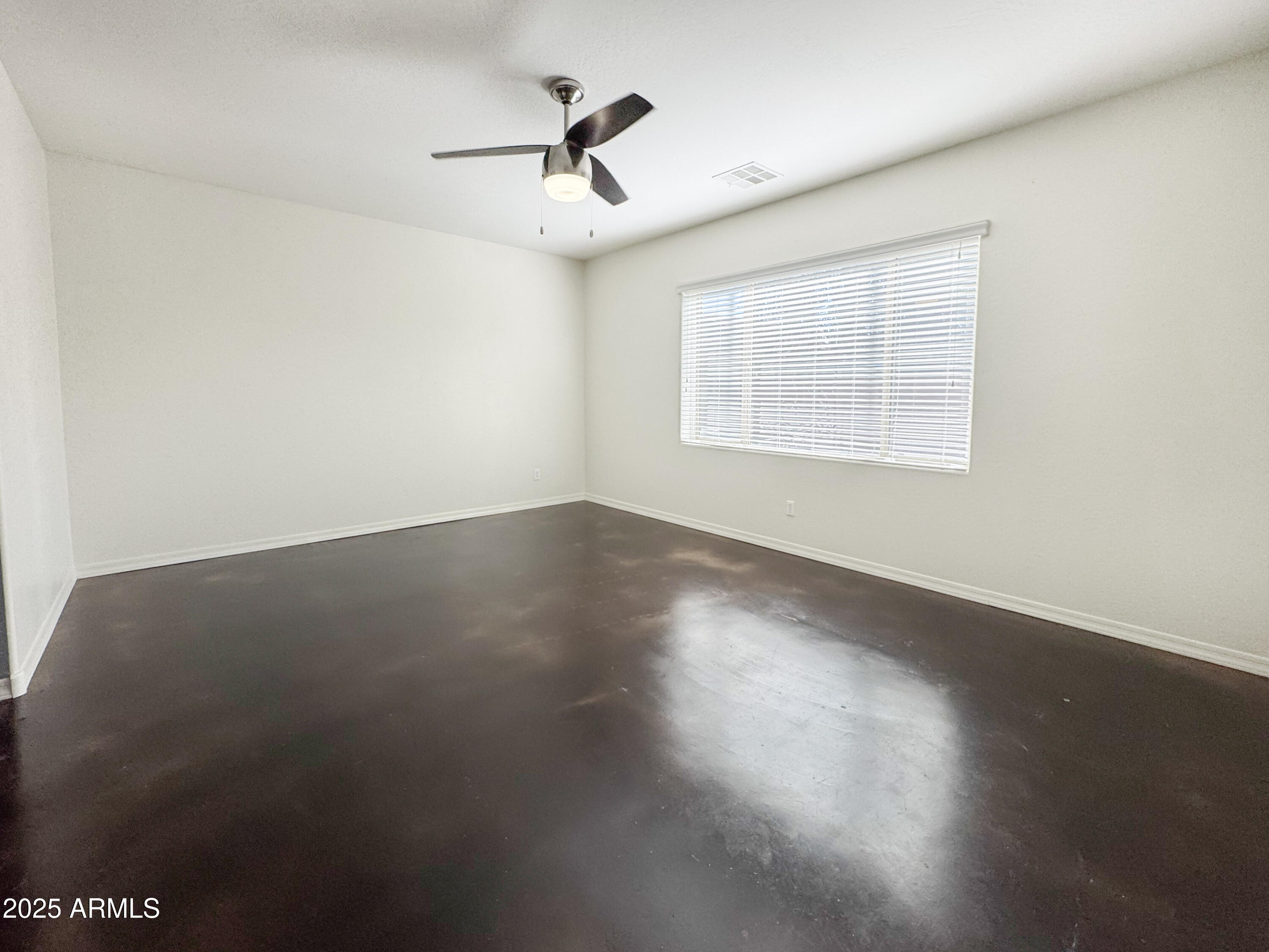 3141 East Patrick Street Gilbert, AZ 85295 - Photo 13 of 32 a view of room window and wooden floor
